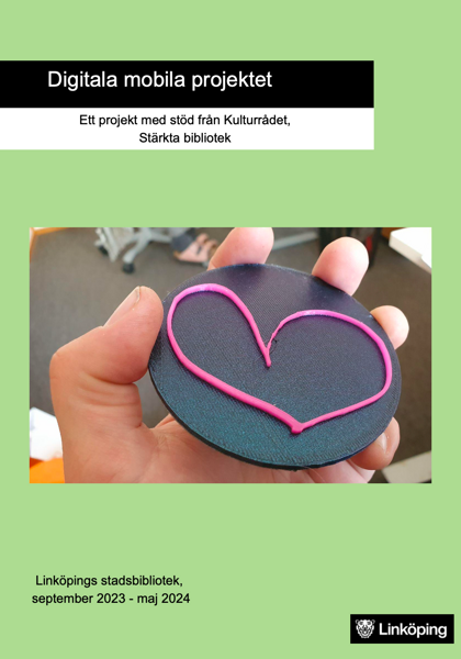 En person som håller ett hjärtformat föremål i handen.